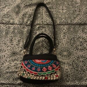 Cute black and pink multi color purse